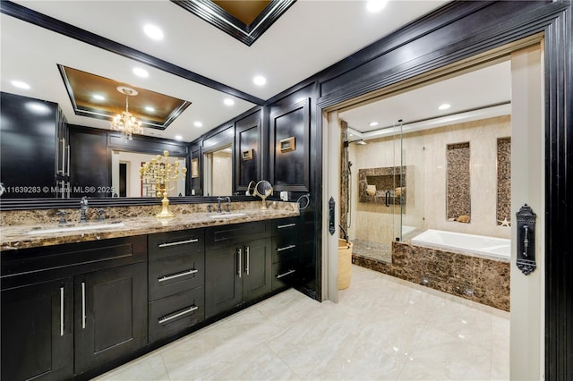 bathroom with a bath, ornamental molding, a sink, and tiled shower