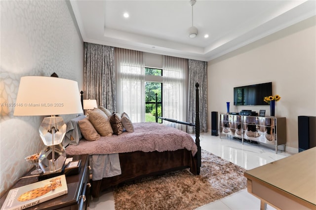 bedroom with a tray ceiling