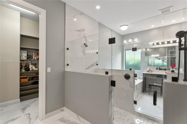 bathroom featuring an enclosed shower