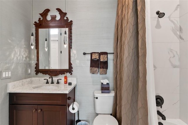 full bathroom featuring vanity, toilet, and shower / tub combo with curtain