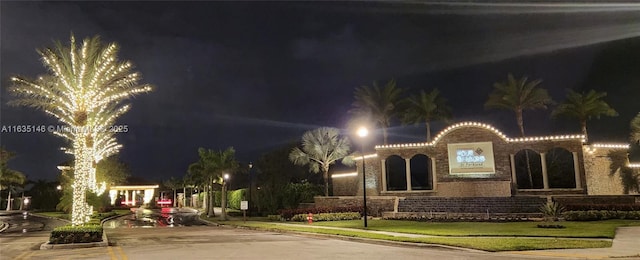 view of front of house with a yard