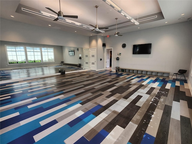 interior space featuring ceiling fan