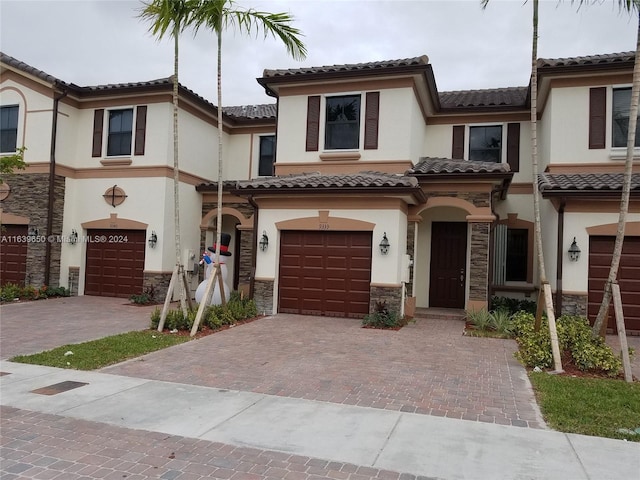 view of front of home with a garage