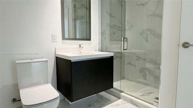 bathroom featuring a shower with door, vanity, and toilet