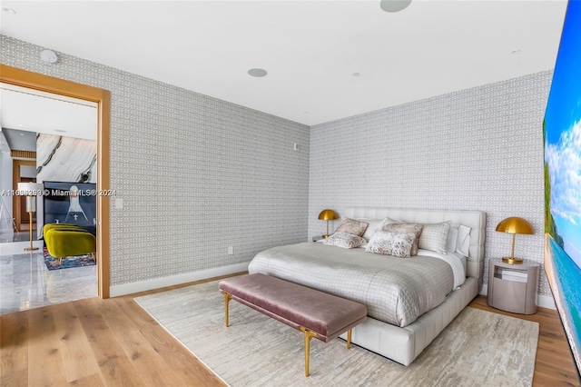 bedroom featuring light hardwood / wood-style flooring