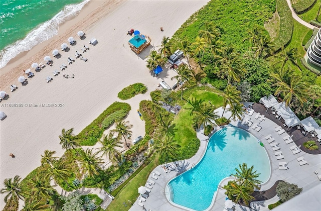 aerial view featuring a water view and a view of the beach