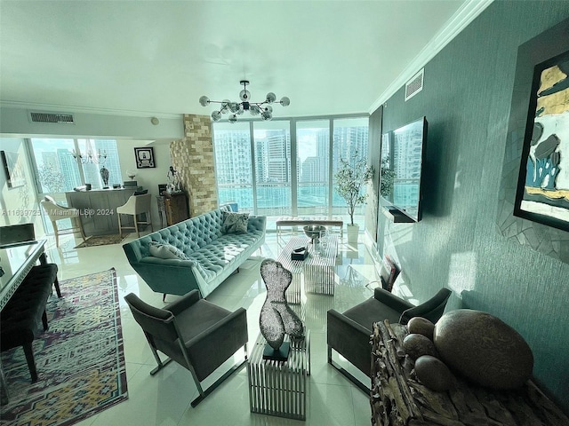 living room featuring tile patterned floors, ornamental molding, an inviting chandelier, and brick wall