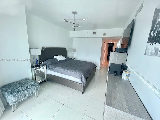 bedroom with light tile patterned flooring