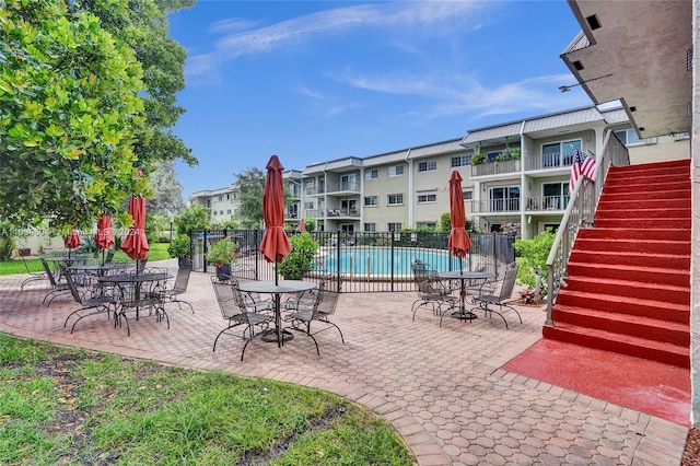 view of patio / terrace with a community pool