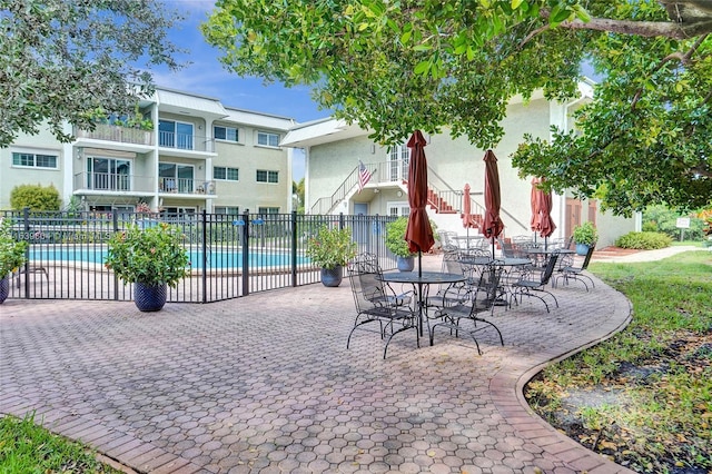 view of patio / terrace with a community pool