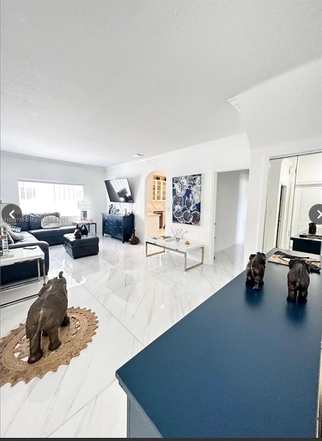 living room featuring a textured ceiling