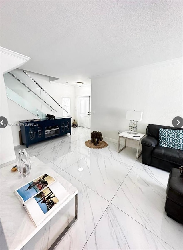 living room with a textured ceiling