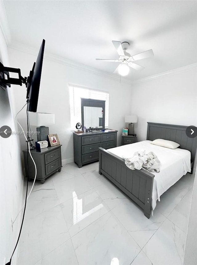 bedroom with ceiling fan and ornamental molding