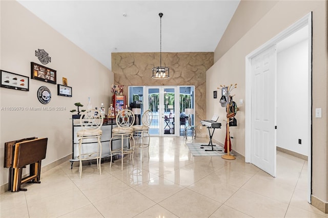 interior space with french doors and lofted ceiling