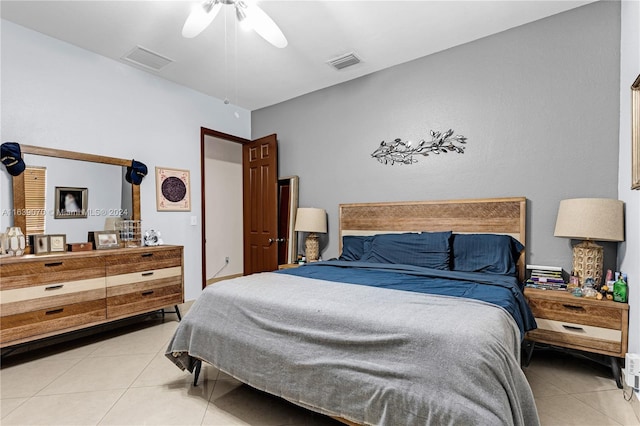 bedroom featuring ceiling fan and light tile patterned flooring