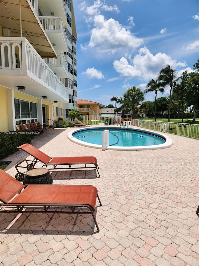 view of pool with a patio