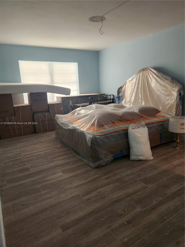 bedroom featuring hardwood / wood-style floors