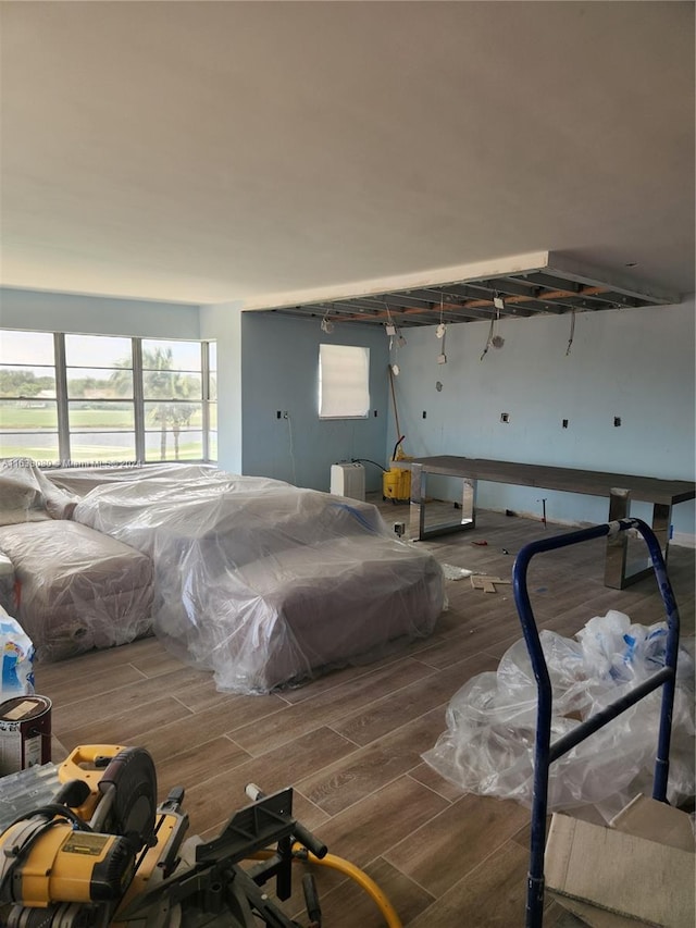 bedroom with wood-type flooring