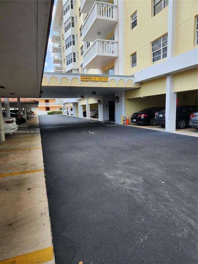 view of building exterior featuring a carport