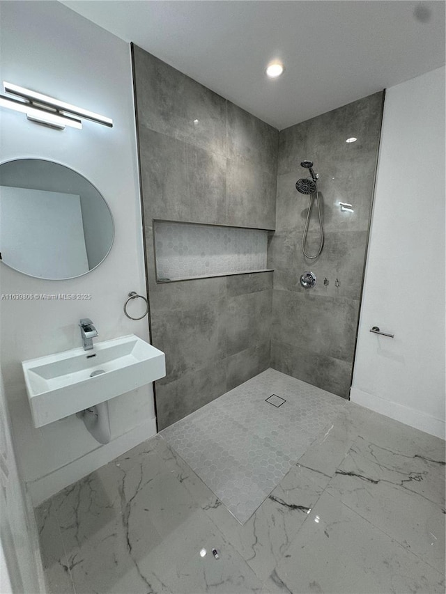 bathroom with sink and a shower