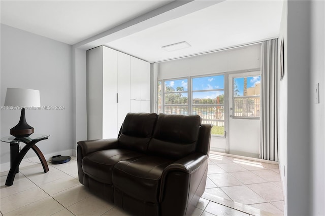 living area with light tile patterned flooring