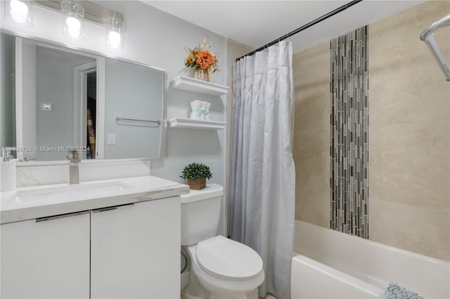 full bathroom with toilet, shower / tub combo, and vanity