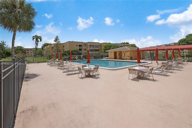 view of swimming pool featuring a patio