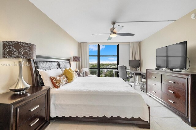 tiled bedroom with ceiling fan