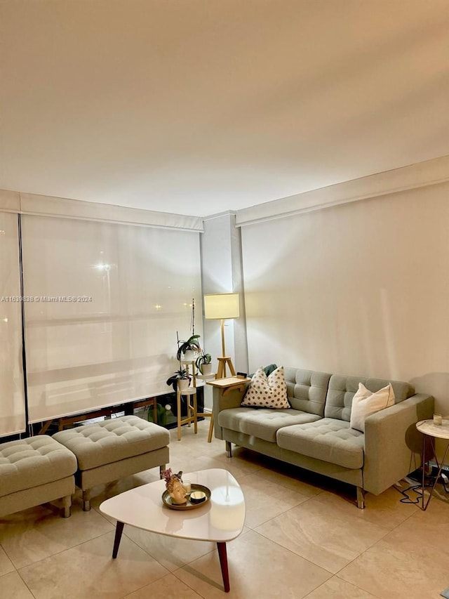 living room with light tile patterned floors