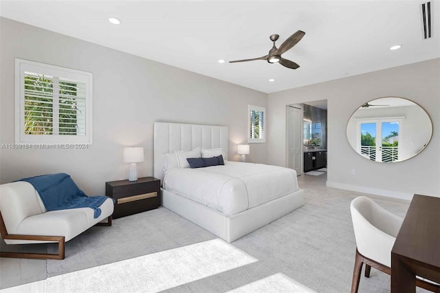 bedroom featuring ceiling fan and multiple windows