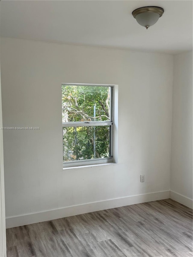 empty room featuring light hardwood / wood-style floors