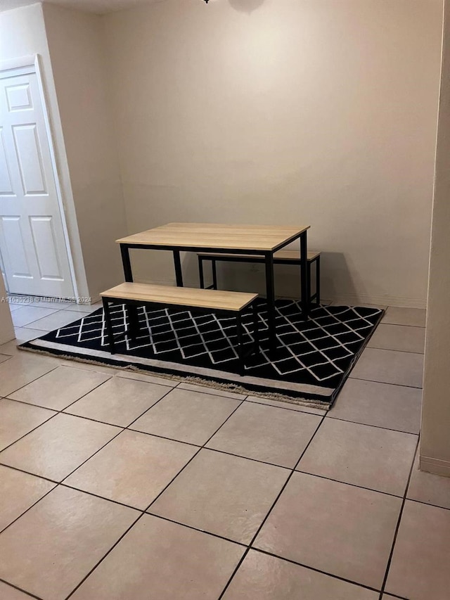 interior space with light tile patterned floors