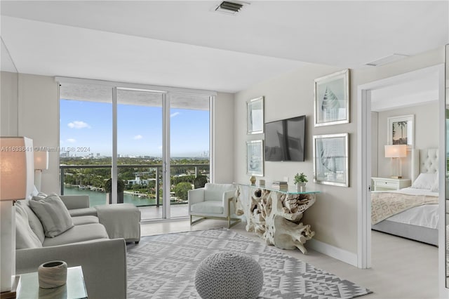 living room with floor to ceiling windows