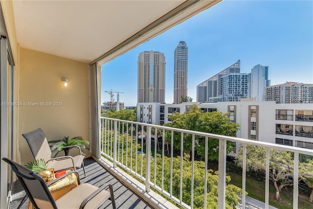 balcony featuring a city view