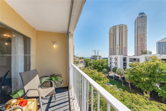 balcony featuring a city view