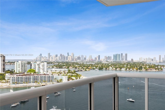 balcony featuring a water view