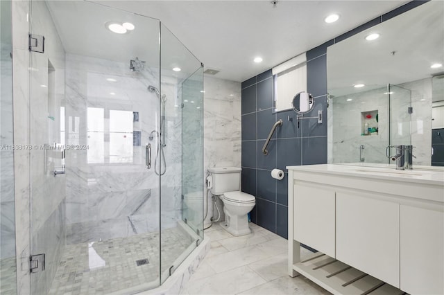 bathroom featuring an enclosed shower, vanity, toilet, and tile walls