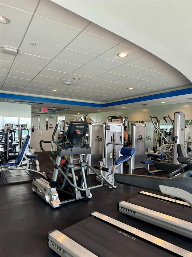 workout area with a paneled ceiling