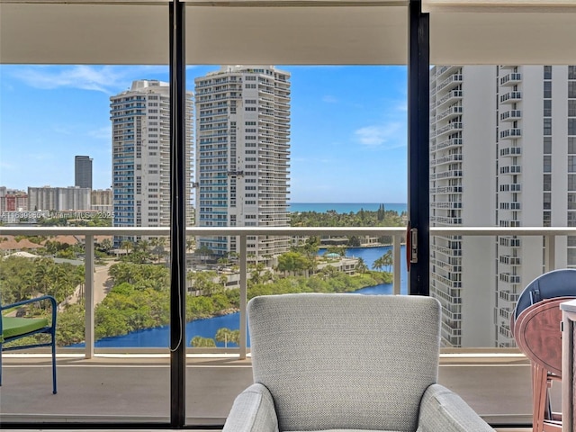 balcony featuring a water view