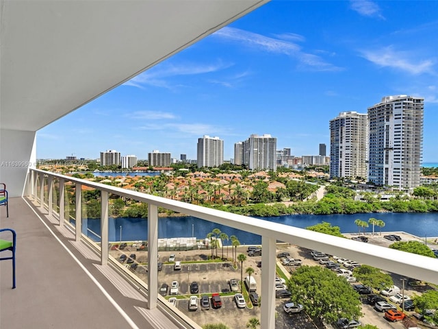 balcony featuring a water view