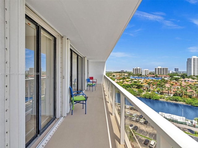 balcony with a city view and a water view