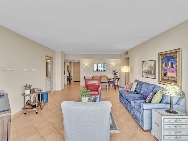 living room featuring light tile patterned floors