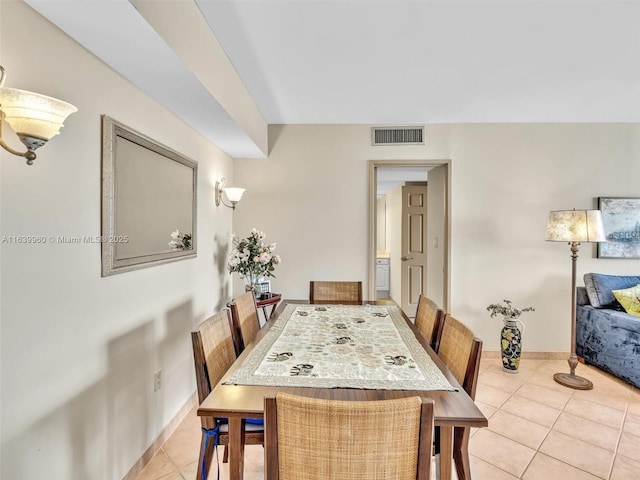 dining room featuring light tile patterned floors