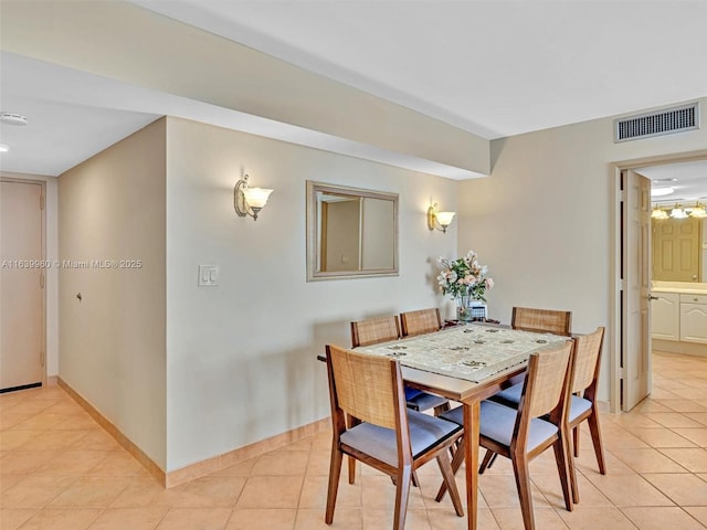 dining room with light tile patterned floors