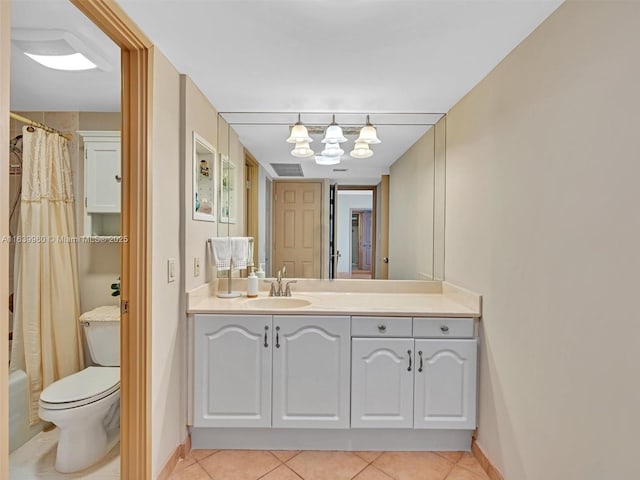 full bathroom featuring vanity, shower / tub combo, tile patterned floors, and toilet