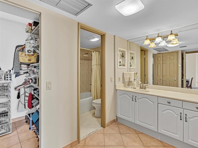 full bathroom with tile patterned flooring, vanity, shower / tub combo with curtain, and toilet