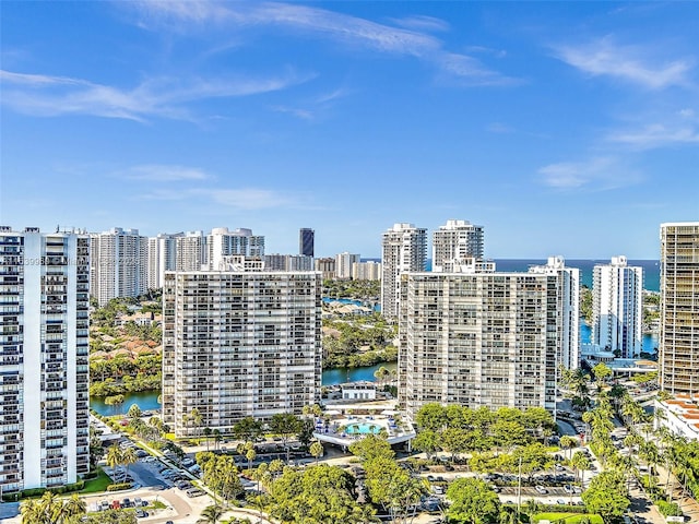 exterior space featuring a city view and a water view