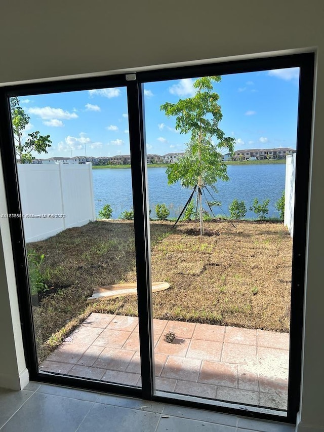 entryway with a water view