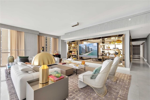 living room with tile patterned floors