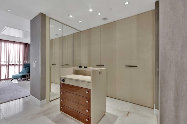 bathroom featuring vanity and tile patterned flooring